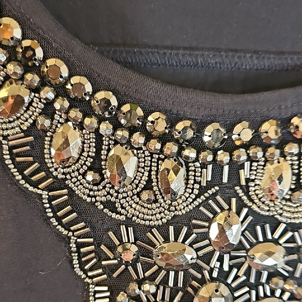 Chic Black Mini Dress with Embellished Neckline - Picture 7 of 10